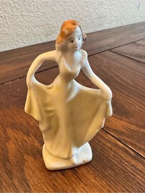 Vintage 1930s Japan Miniature Girl holding dress Figurine